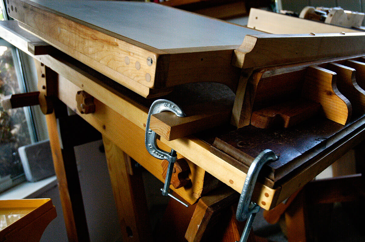 This close-up shows the runners by which the platform to the left of the stone is clamped to the lef...